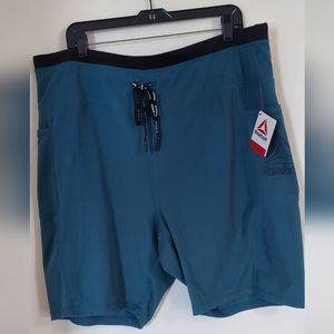 Reebok men's shirts size 3x. A1